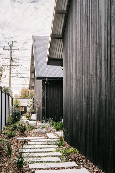 “Our drive to have a landscaped garden was for the kids to be able to have a space where they could adventure around the place,” says Natalie. “And part of what we enjoy is being able to sit and admire something that’s so beautiful.” They chose hardy Australian native plants to make the garden easy to maintain with minimal water.