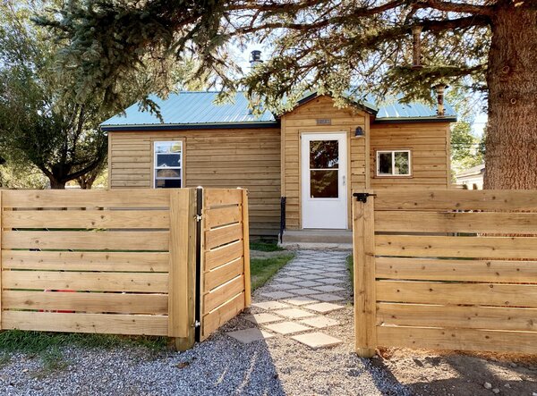 After - exterior and new cedar fence