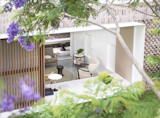 This Brick Backyard House Doubles as a Sunken Living Room for the Garden